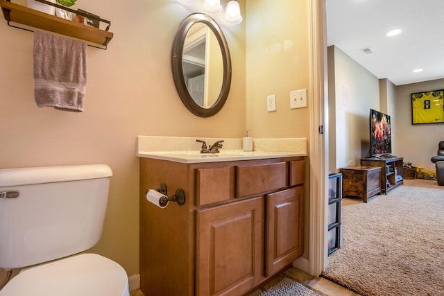 765 Huntley Ave, Logan, OH 43138 - half bath featuring toilet, vanity, and recessed lighting