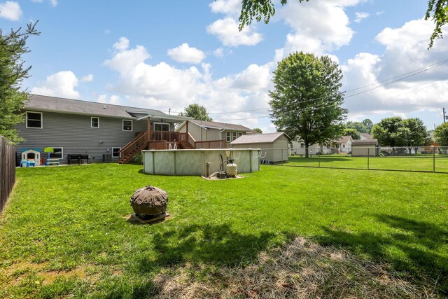 765 Huntley Ave, Logan, OH 43138 - view of yard featuring a fire pit, stairs, and a deck