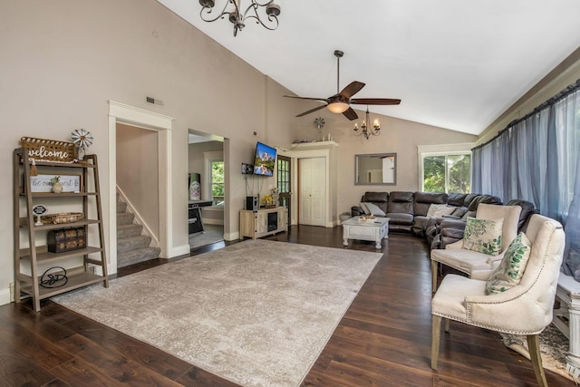 26110 Big Pine Rd, Rockbridge, OH 43149 - living area featuring a ceiling fan, dark wood-style floors, a chandelier, stairs, and high vaulted ceiling