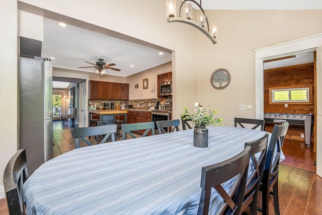 26110 Big Pine Rd, Rockbridge, OH 43149 - dining space featuring dark wood-style flooring, recessed lighting, a ceiling fan, and a chandelier