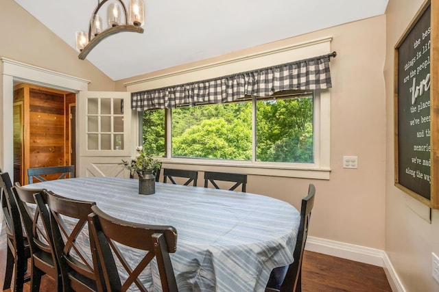 26110 Big Pine Rd, Rockbridge, OH 43149 - dining area featuring lofted ceiling, dark wood-type flooring, and a chandelier