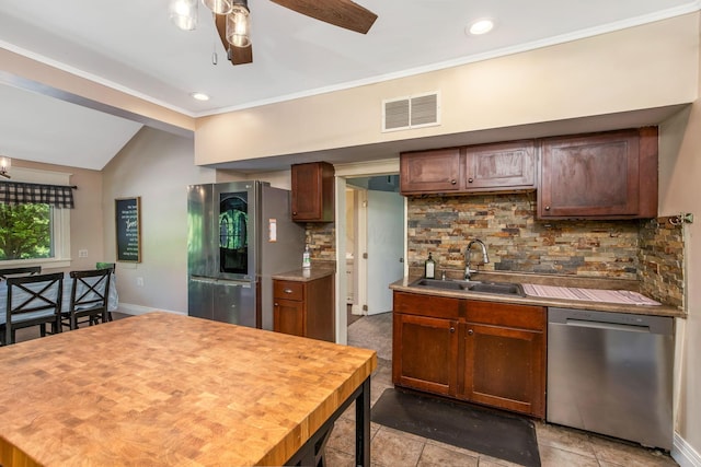 26110 Big Pine Rd, Rockbridge, OH 43149 - kitchen featuring stainless steel appliances, ceiling fan, tasteful backsplash, lofted ceiling, and recessed lighting