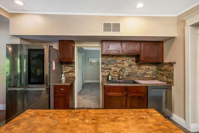 26110 Big Pine Rd, Rockbridge, OH 43149 - kitchen featuring smart refrigerator, butcher block counters, stainless steel dishwasher, crown molding, and tasteful backsplash