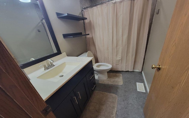 3230 Saint Bernard Cir, Columbus, OH 43232 - full bathroom with vanity, toilet, concrete floors, and a shower with shower curtain