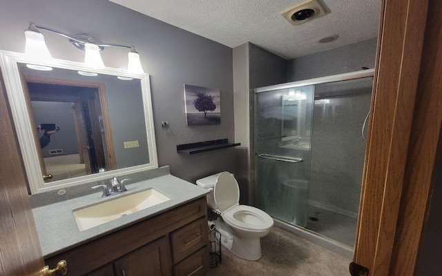 3230 Saint Bernard Cir, Columbus, OH 43232 - bathroom featuring a stall shower, vanity, toilet, and a textured ceiling