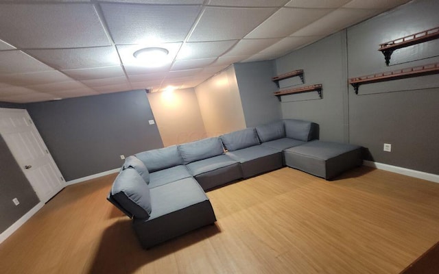 3230 Saint Bernard Cir, Columbus, OH 43232 - living area featuring a paneled ceiling, wood finished floors, and baseboards