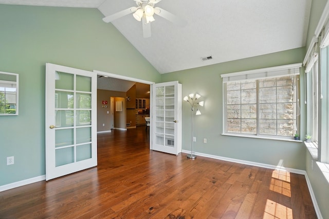 4298 Bridgeside Pl, New Albany, OH 43054 - unfurnished room featuring french doors, wood finished floors, baseboards, a ceiling fan, and high vaulted ceiling