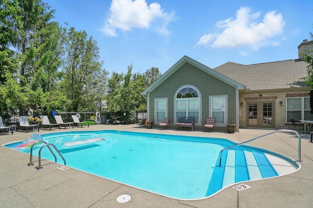 4298 Bridgeside Pl, New Albany, OH 43054 - community pool featuring french doors and a patio