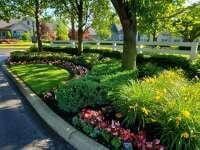 4298 Bridgeside Pl, New Albany, OH 43054 - surrounding community with a vegetable garden
