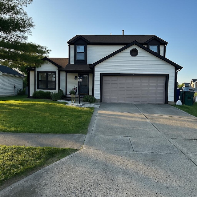 1327 Pinnacle Dr, Columbus, OH 43204 - traditional home with driveway, a front lawn, and a garage