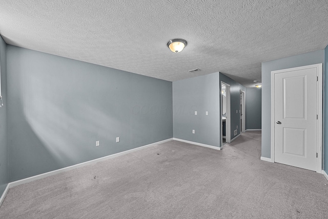 5801 Bridgehampton Dr, New Albany, OH 43054 - carpeted empty room with baseboards and a textured ceiling