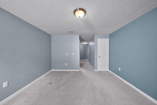 5801 Bridgehampton Dr, New Albany, OH 43054 - carpeted spare room featuring a textured ceiling