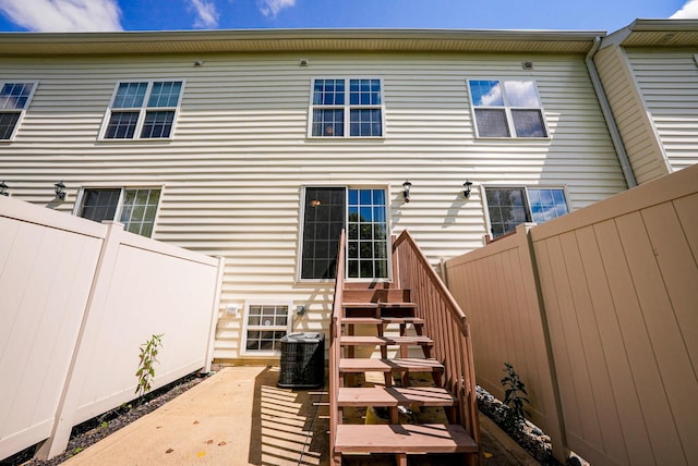5801 Bridgehampton Dr, New Albany, OH 43054 - rear view of property featuring a patio and stairway
