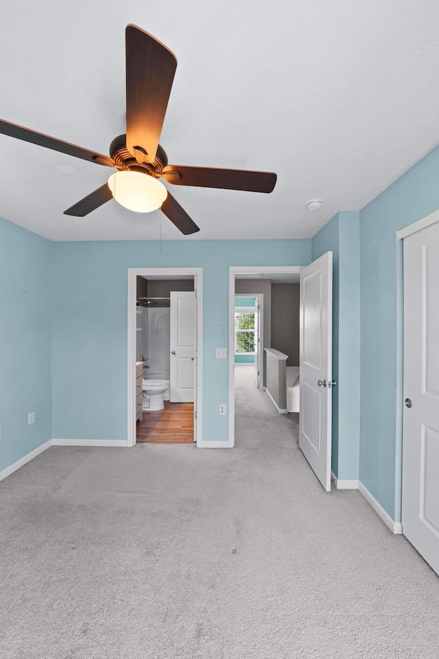 5801 Bridgehampton Dr, New Albany, OH 43054 - unfurnished bedroom featuring carpet, ceiling fan, and ensuite bathroom