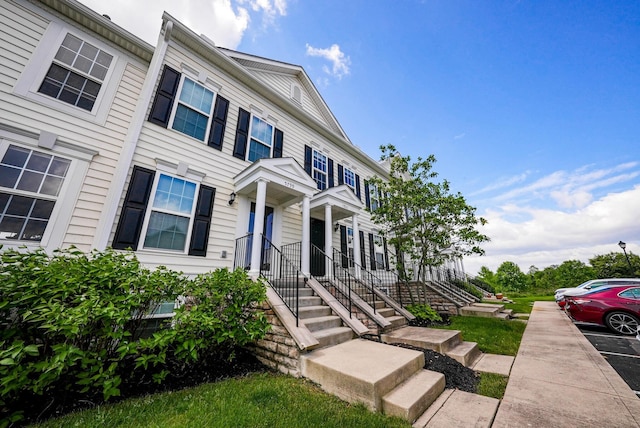 5801 Bridgehampton Dr, New Albany, OH 43054 - view of property featuring uncovered parking