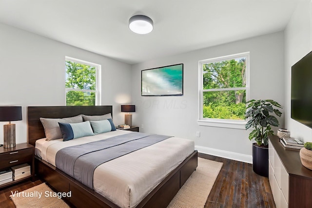 1271 Moundview Ave, Columbus, OH 43207 - bedroom featuring baseboards and dark wood-type flooring