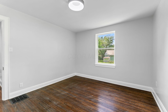 1271 Moundview Ave, Columbus, OH 43207 - spare room with baseboards and dark wood-style floors