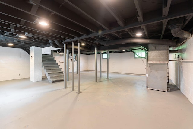 1271 Moundview Ave, Columbus, OH 43207 - basement featuring stairway and heating unit