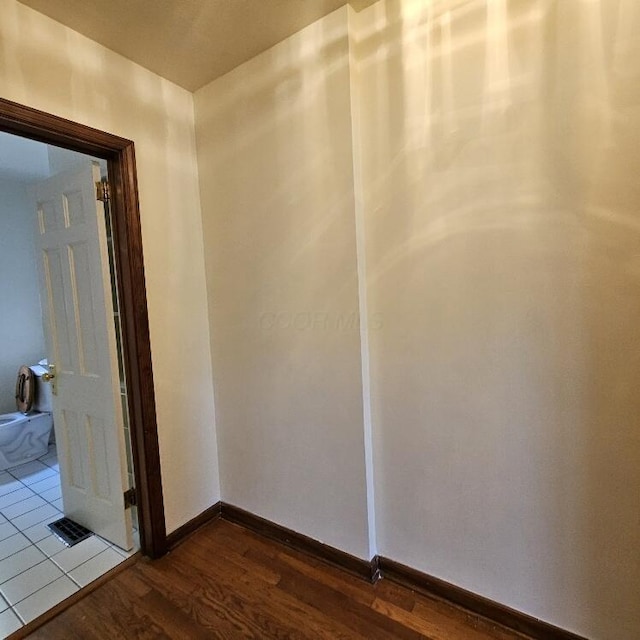 2325 E Livingston Ave, Columbus, OH 43209 - spare room with dark wood-style floors and baseboards