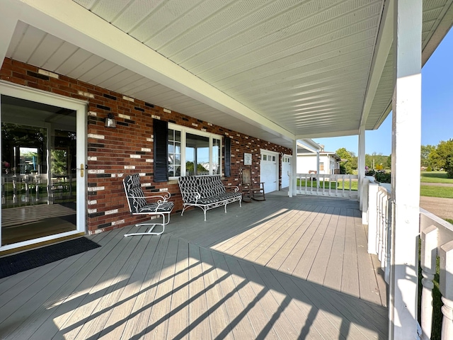 128 Ivy St, Newark, OH 43055 - porch featuring a garage