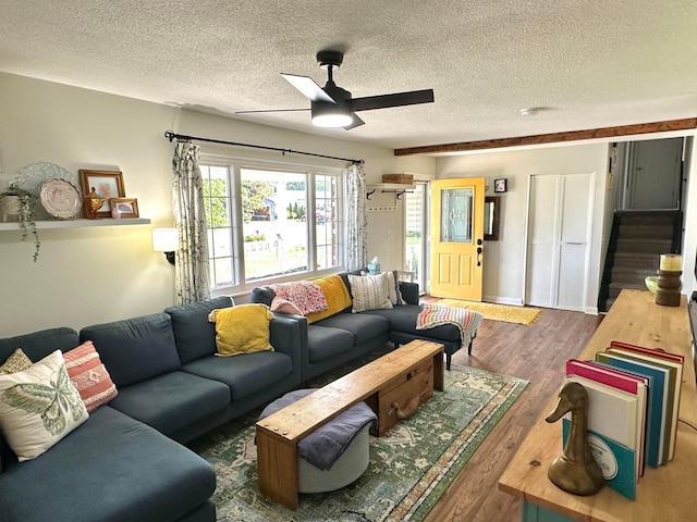 128 Ivy St, Newark, OH 43055 - living area featuring stairs, a ceiling fan, wood finished floors, and a textured ceiling