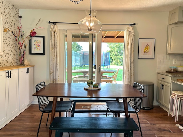 128 Ivy St, Newark, OH 43055 - dining room with dark wood-style flooring