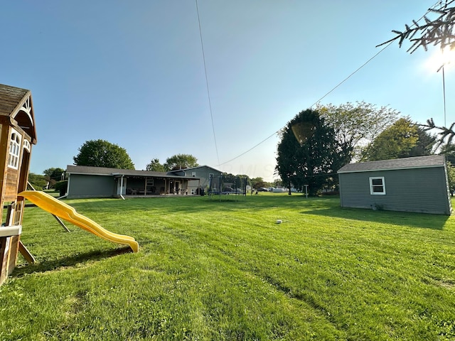 128 Ivy St, Newark, OH 43055 - view of grassy yard with a playground