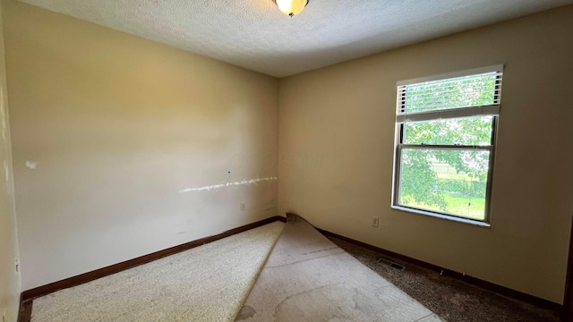 624 Village Park Dr, Powell, OH 43065 - unfurnished room featuring light colored carpet and a textured ceiling