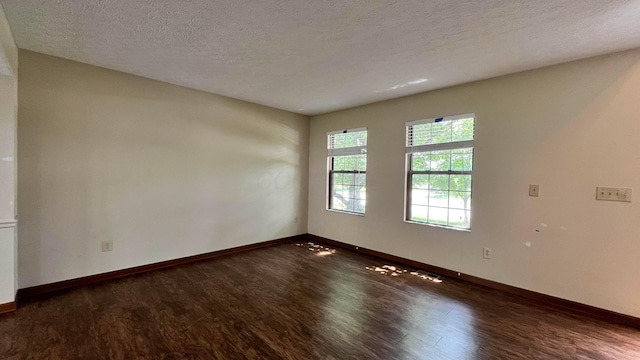 624 Village Park Dr, Powell, OH 43065 - spare room with wood finished floors and a textured ceiling