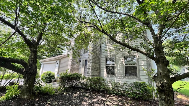 624 Village Park Dr, Powell, OH 43065 - view of property exterior featuring an attached garage