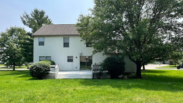 624 Village Park Dr, Powell, OH 43065 - rear view of house featuring a wooden deck, stucco siding, and a yard