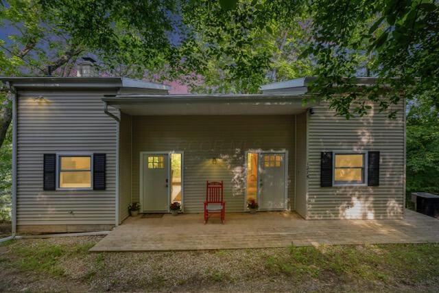 1275 Taos Ln, Sugar Grove, OH 43155 - rear view of house with a deck and central air condition unit