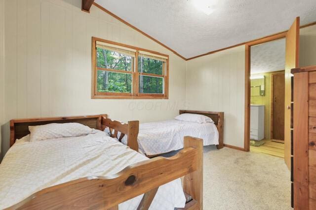 1275 Taos Ln, Sugar Grove, OH 43155 - bedroom with carpet, lofted ceiling, and connected bathroom