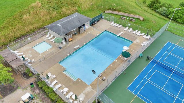 1275 Taos Ln, Sugar Grove, OH 43155 - aerial view of property and surrounding area with a pool area