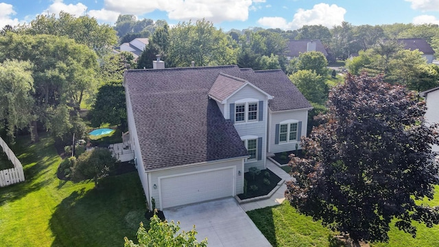 583 Marhurst Ct, Galloway, OH 43119 - view of subject property featuring a tree filled landscape