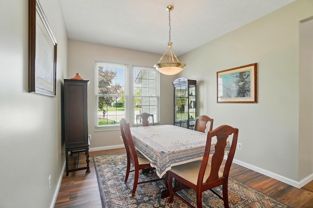 583 Marhurst Ct, Galloway, OH 43119 - dining area featuring dark wood-type flooring and baseboards
