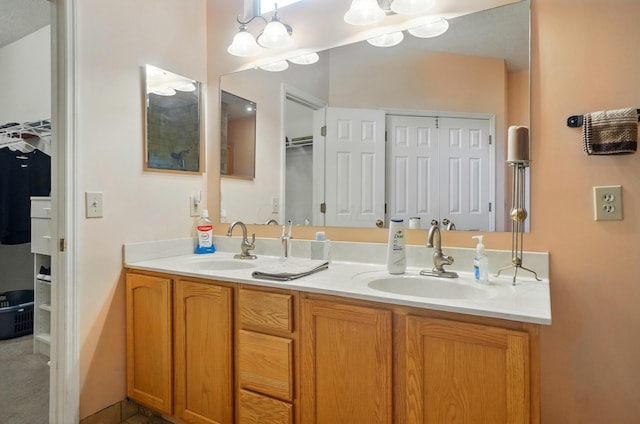 583 Marhurst Ct, Galloway, OH 43119 - full bath featuring double vanity and a walk in closet