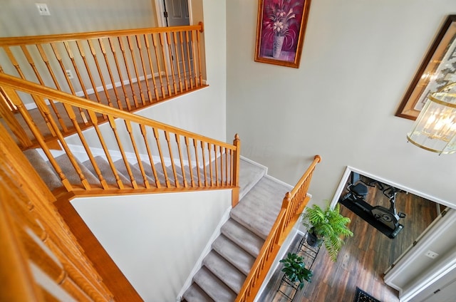 583 Marhurst Ct, Galloway, OH 43119 - staircase with wood finished floors and baseboards