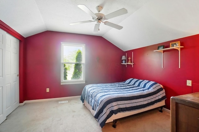583 Marhurst Ct, Galloway, OH 43119 - bedroom featuring lofted ceiling, baseboards, light colored carpet, and a ceiling fan