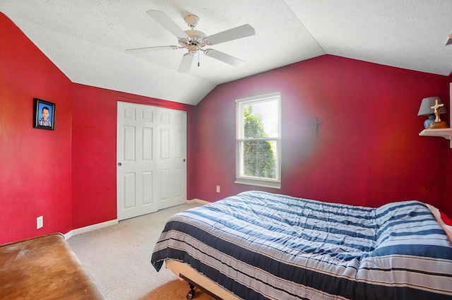 583 Marhurst Ct, Galloway, OH 43119 - carpeted bedroom featuring vaulted ceiling, a textured ceiling, a ceiling fan, and baseboards