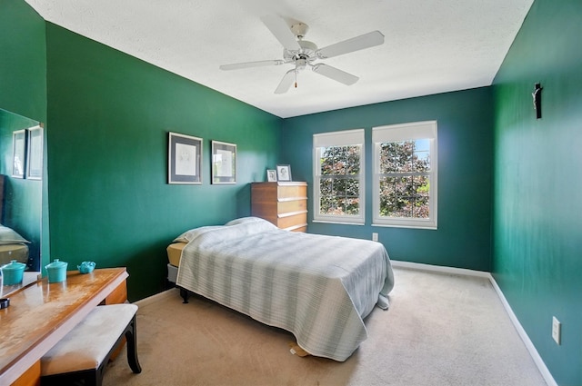 583 Marhurst Ct, Galloway, OH 43119 - carpeted bedroom featuring baseboards, a ceiling fan, and a textured ceiling