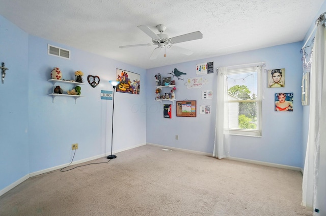 583 Marhurst Ct, Galloway, OH 43119 - carpeted empty room featuring baseboards, ceiling fan, and a textured ceiling