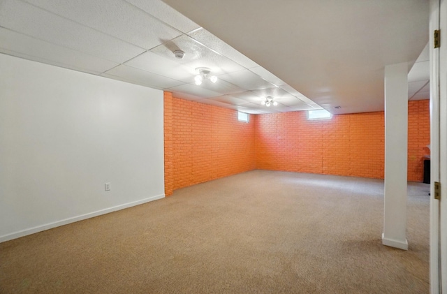 583 Marhurst Ct, Galloway, OH 43119 - finished basement with brick wall, carpet, baseboards, and a drop ceiling