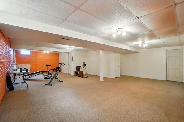 583 Marhurst Ct, Galloway, OH 43119 - exercise area with a drop ceiling, carpet floors, and baseboards