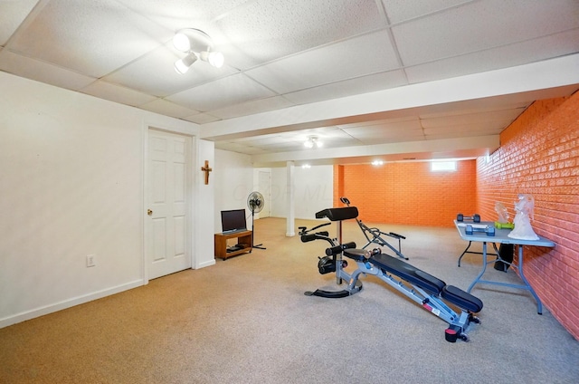 583 Marhurst Ct, Galloway, OH 43119 - exercise area with carpet floors, a paneled ceiling, and baseboards