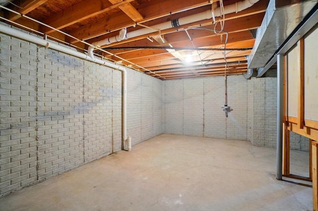 583 Marhurst Ct, Galloway, OH 43119 - unfinished below grade area with brick wall