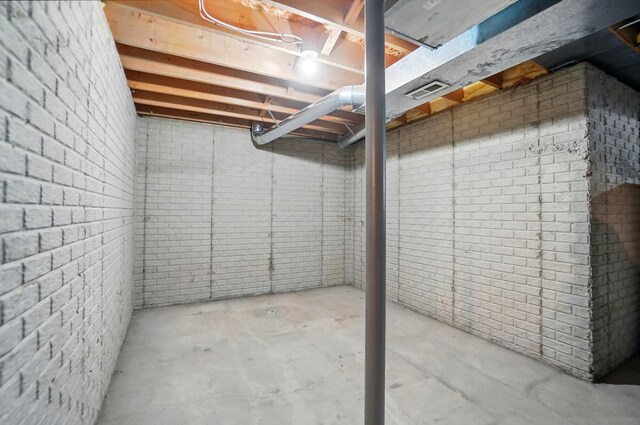 583 Marhurst Ct, Galloway, OH 43119 - unfinished basement with brick wall