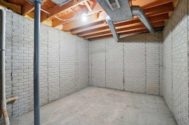 583 Marhurst Ct, Galloway, OH 43119 - unfinished below grade area with brick wall