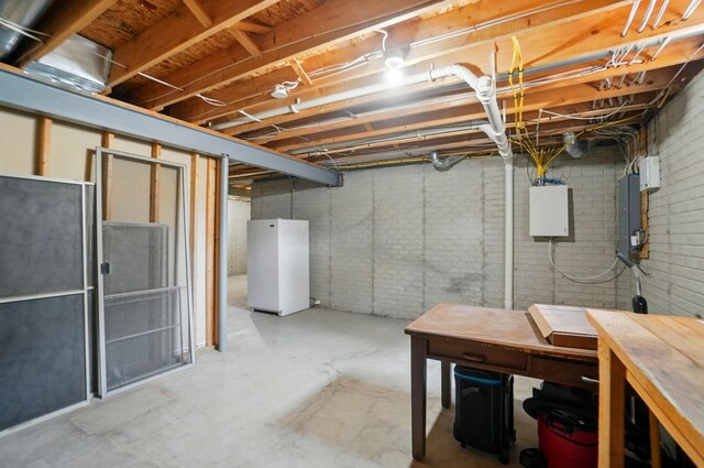 583 Marhurst Ct, Galloway, OH 43119 - unfinished basement with freestanding refrigerator
