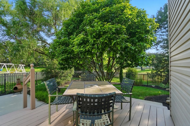 583 Marhurst Ct, Galloway, OH 43119 - wooden deck with a fenced backyard and outdoor dining area